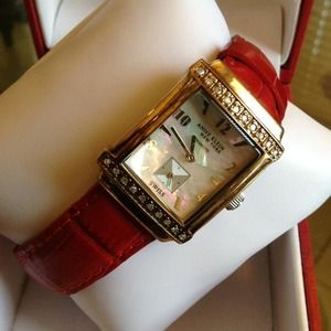 Red leather Anne Klein watch. Never worn.