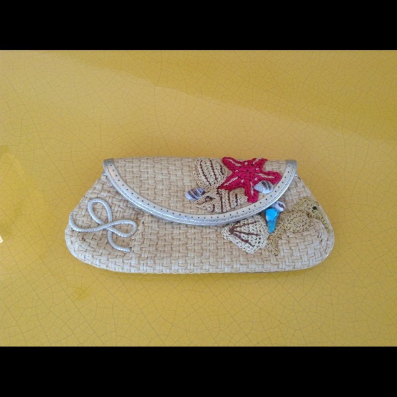 Summer clutch by London . NOW $30