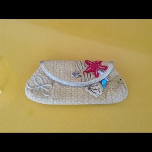 Summer clutch by London . NOW $30