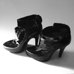 Patent leather booties by Report Signature