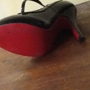 Black red bottom shoes from spirit
