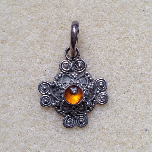 Mini silver pendant