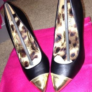Shoedazzle Black Pumps with Gold Toe