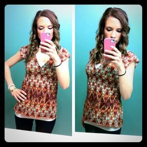 Printed top with flutter sleeves and lace back