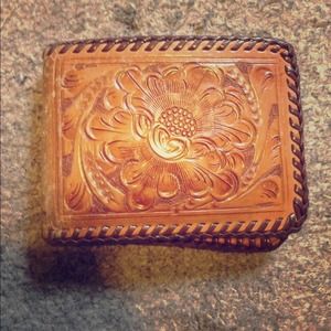 Vintage carved leather wallet.