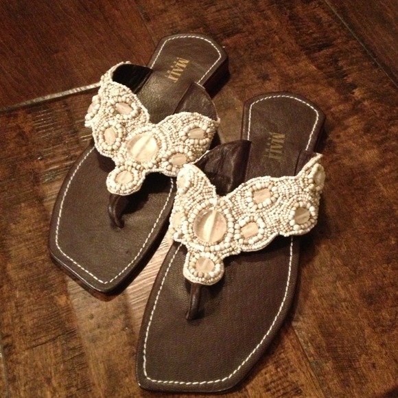Never worn! White beaded flat sandals.