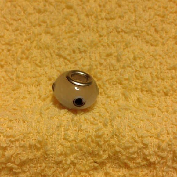 Light pink with black and white spots. - Picture 2 of 2