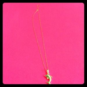 14 k white gold chain with a silver dolphin !