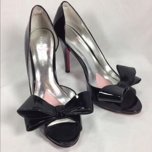 Black patent leather bow heels