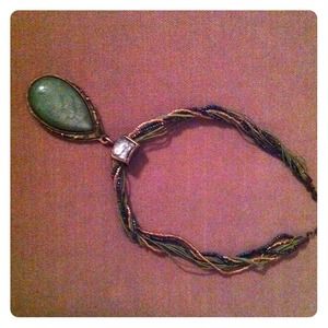 Jade green necklace with broach.