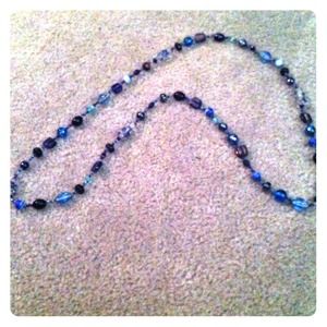 Lovely blue glass necklace.
