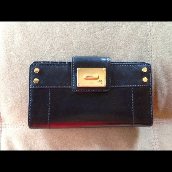 Milly black leather wallet. Brand new!