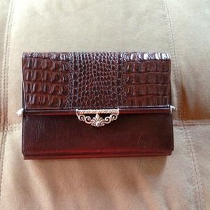 Brighton cross body bag.  Brown leather.