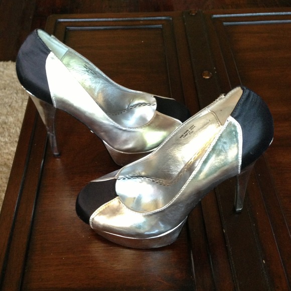 SOLD****BEBE stilettos. 7 1/2. NEVER WORN
