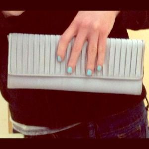 Silver bag that could be used as a clutch or purse