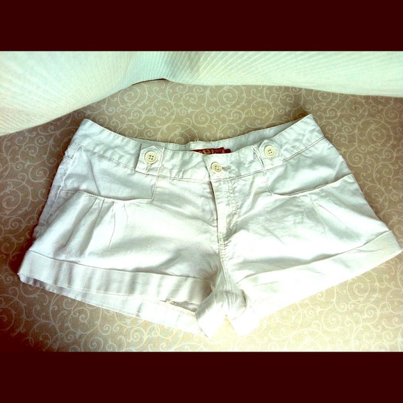 Cute shimmery off white shorts.