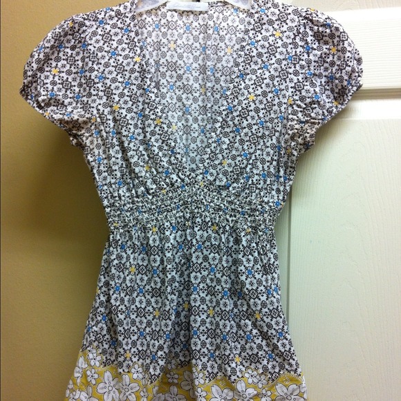 V-neck shirt. Cute and sassy. 100% Cotton