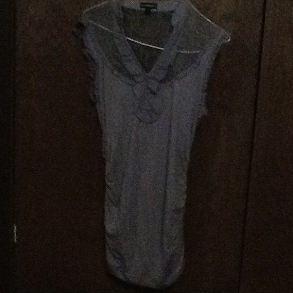 Light gray sleeveless top.