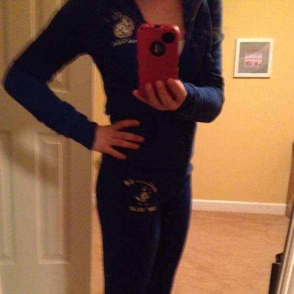 Hollister skinny sweat pants and Zip up sweater .