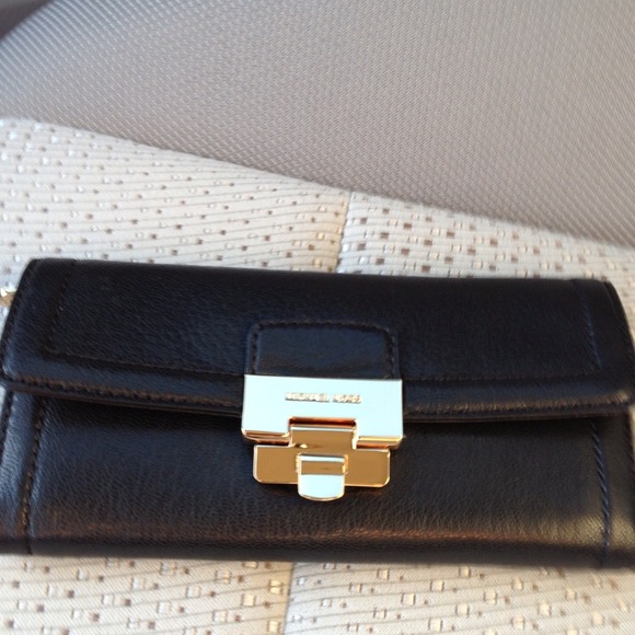 Brand new Michael Kors Deneuve black wallet.