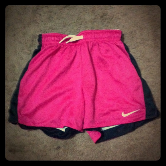 Pink and white Nike shorts