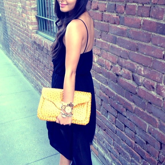 Clutch-Perfect Condition! Only worn once for shoot