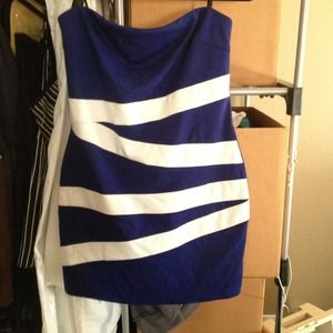 Body con strapless dress with asymmetrical design