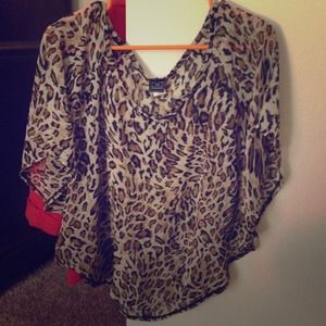 Cheetah print chiffon top.