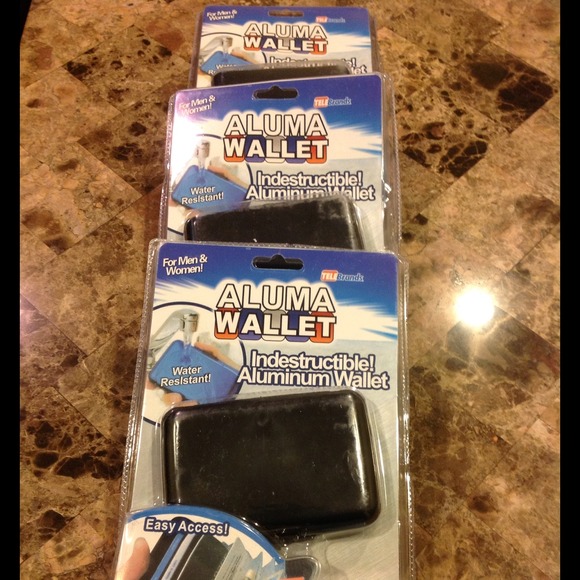 As seen on tv! Lot of 3 aluma wallets brand new!!