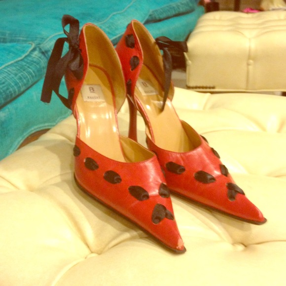 Red leather pointy pumps