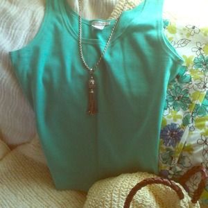 Claudia D. Turquoise tank
