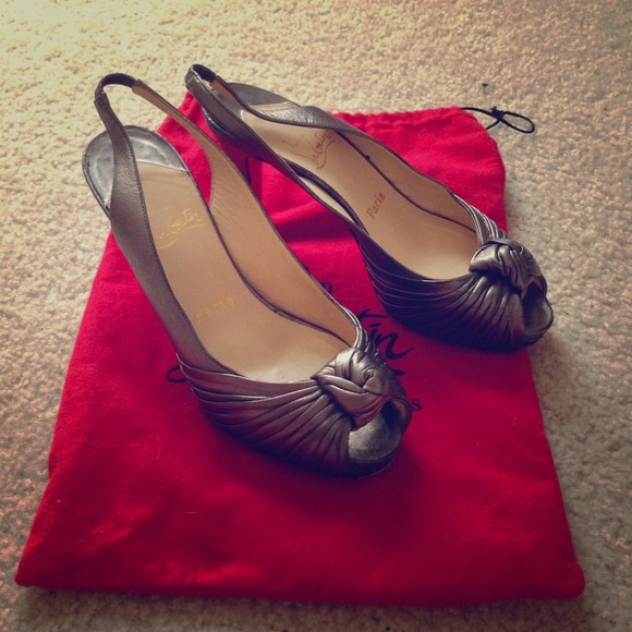 Louboutin! Loved but ready for a new home. - Picture 1 of 4
