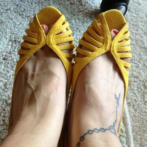 Yellow canvas sling back wedges.