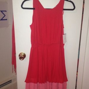 Cute red dress with pink under layer.