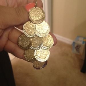 Golden and glittery tiered earrings