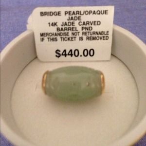 14k jade carved barrel pendant.