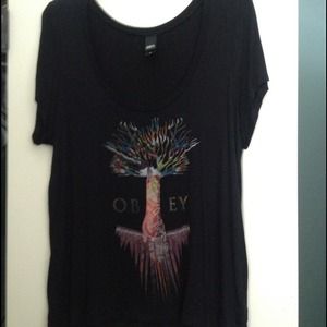 Short sleeve, off the shoulder shirt by Obey