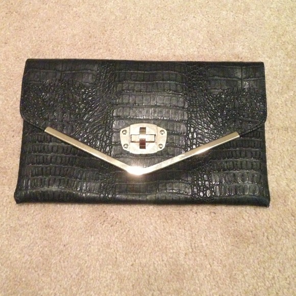 Gold and black snakeskin envelope clutch