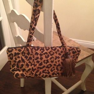 Leopard print carpet bag style handbag