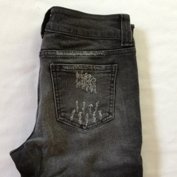 Distressed look dark denim stretch skinnies