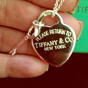 Silver heart/key necklace. NWOT, never been worn.