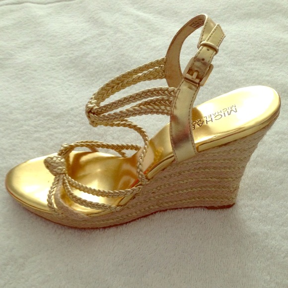 MICHAEL KORS gold strappy wedge sandal.