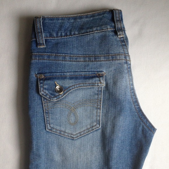 Distressed look boot cut Jeans