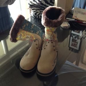 Never worn Ed Hardy boots.