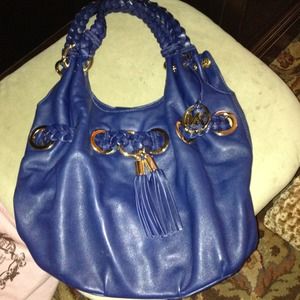 Michael Kors Navy Blue with gold rings handbag