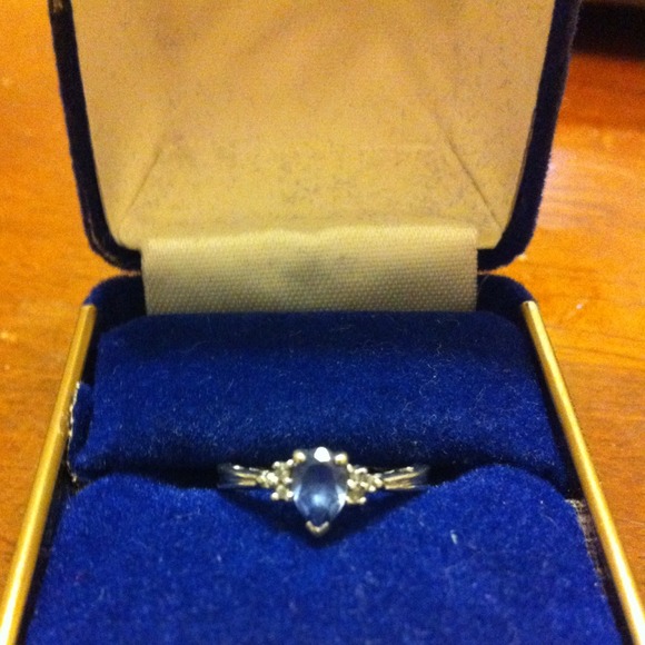 Real silver ring with tear drop shaped sapphire