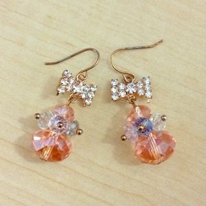 TRADED -- Swarovski crystal earrings with bow