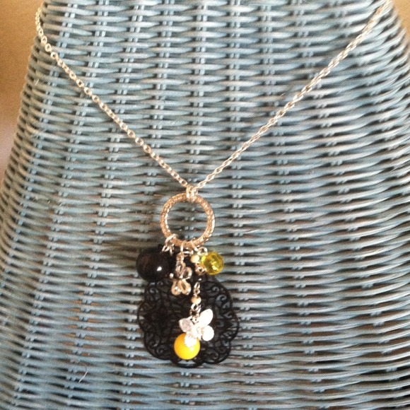 Sold!!! Free Yellow & black neckless.