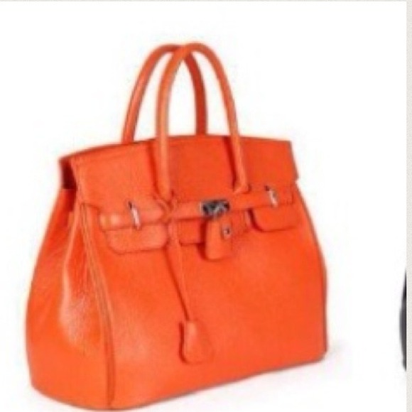 Handbags - An orange faux leather bag