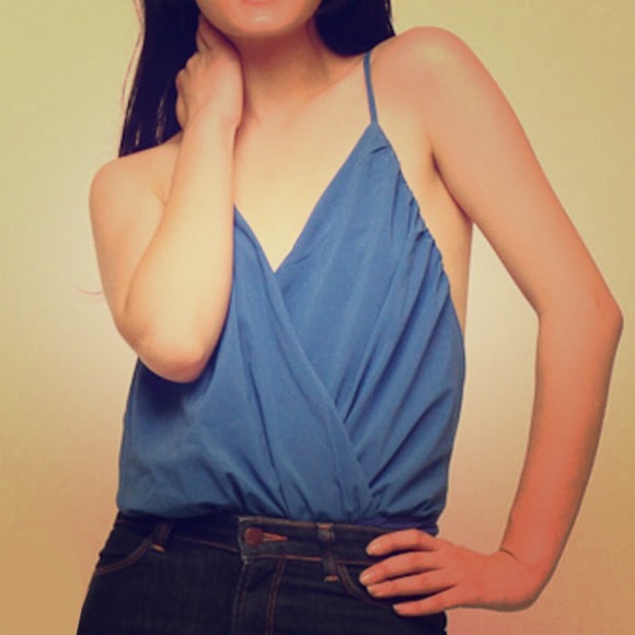 SOLD!! Sexy never-worn bright blue bodysuit